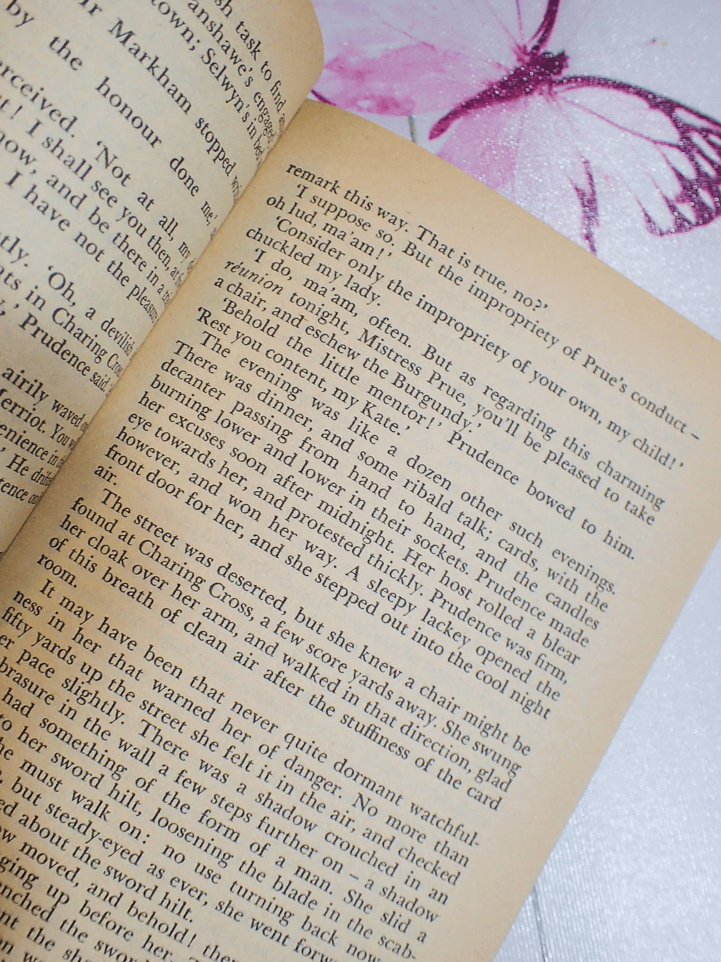 Pages from vintage Pan paperback book, 'The Masqueraders', by Georgette Heyer. 'The evening was like a dozen other such evenings...'