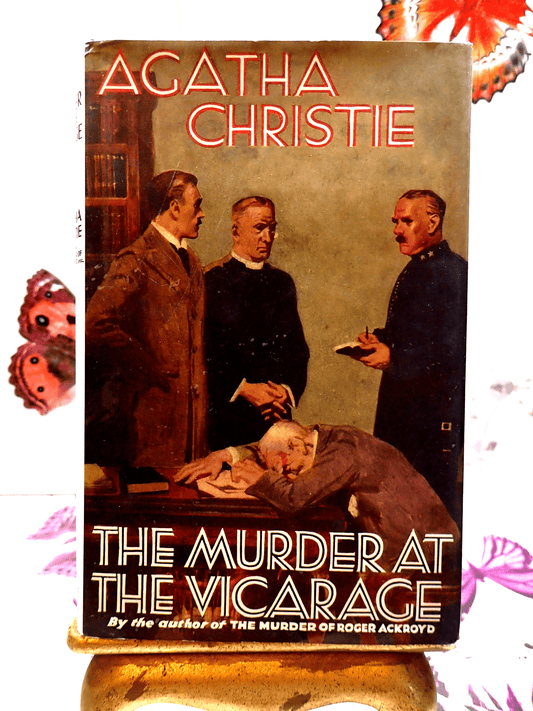 Front cover of Murder at the Vicarage Agatha Christie Hardback Facsimile Vintage Book showing a man dead on his desk