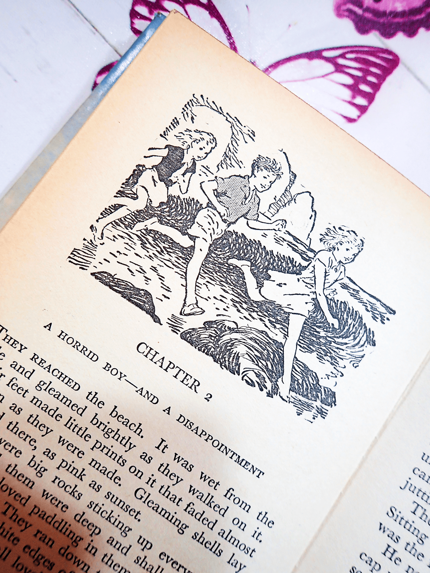 Illustration from Mystery Stories by Enid Blyton Vintage Children's Book Smuggler Ben Secret Cliff Castle 1960's showing three children running on a beach.
