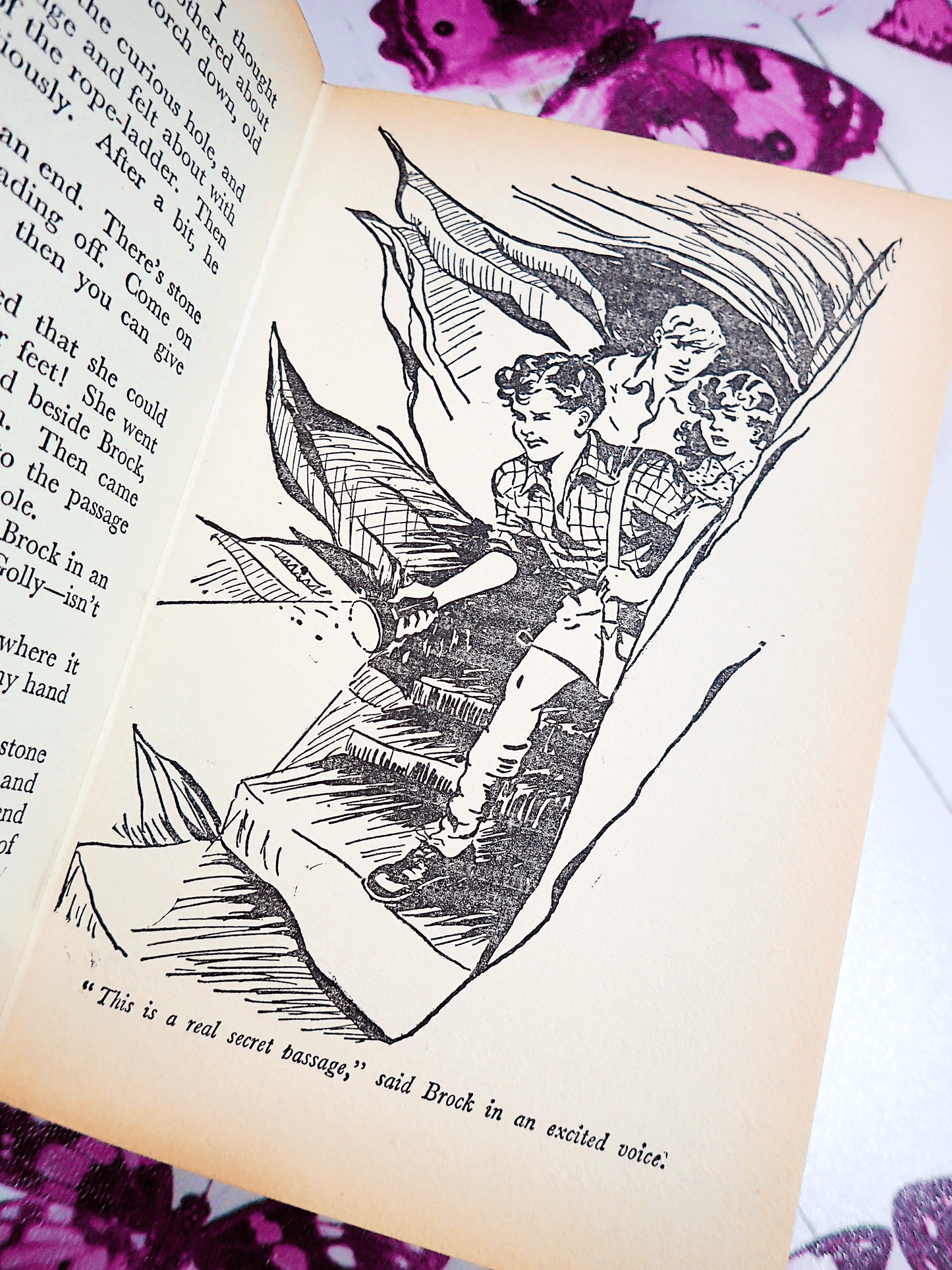 Illustration from Mystery Stories by Enid Blyton Vintage Children's Book Smuggler Ben Secret Cliff Castle 1960's showing three children in a secret passage. 