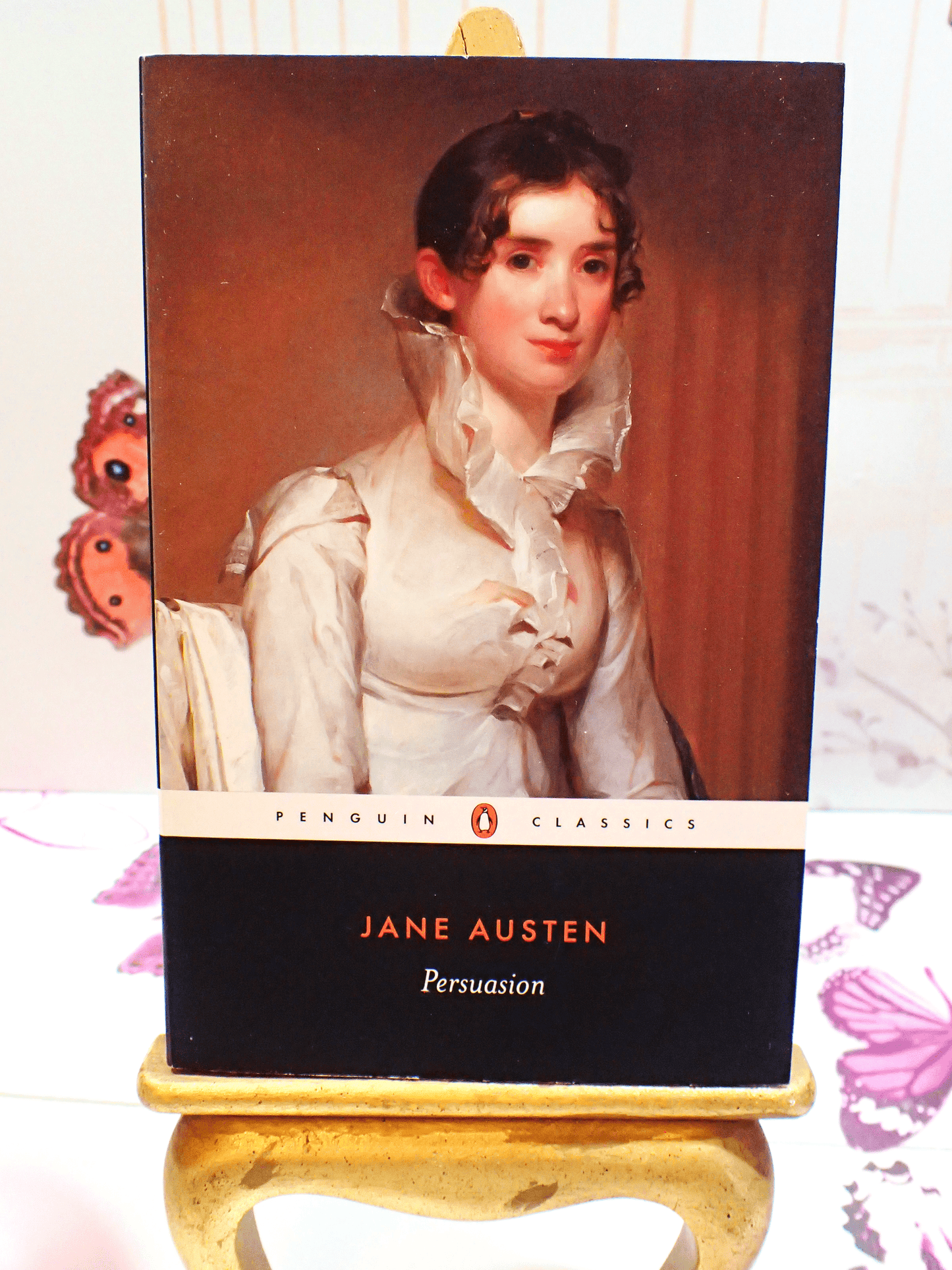 Front cover of Penguin Classic Paperback Persuasion Jane Austen showing a lady in Regency Dress. 