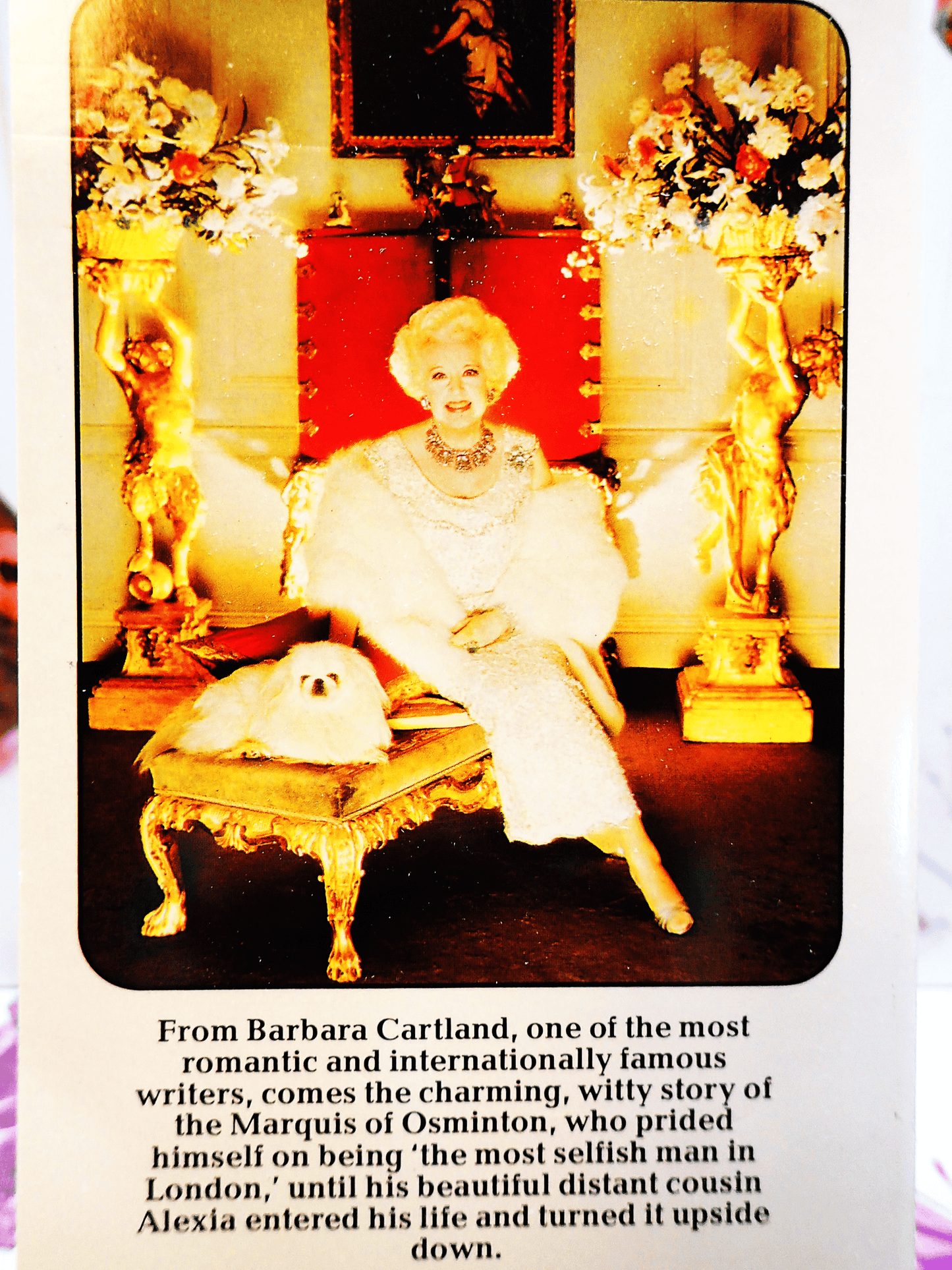 Back cover of The Problems of Love Barbara Cartland Corgi showing photo of the author with her pet dog. 