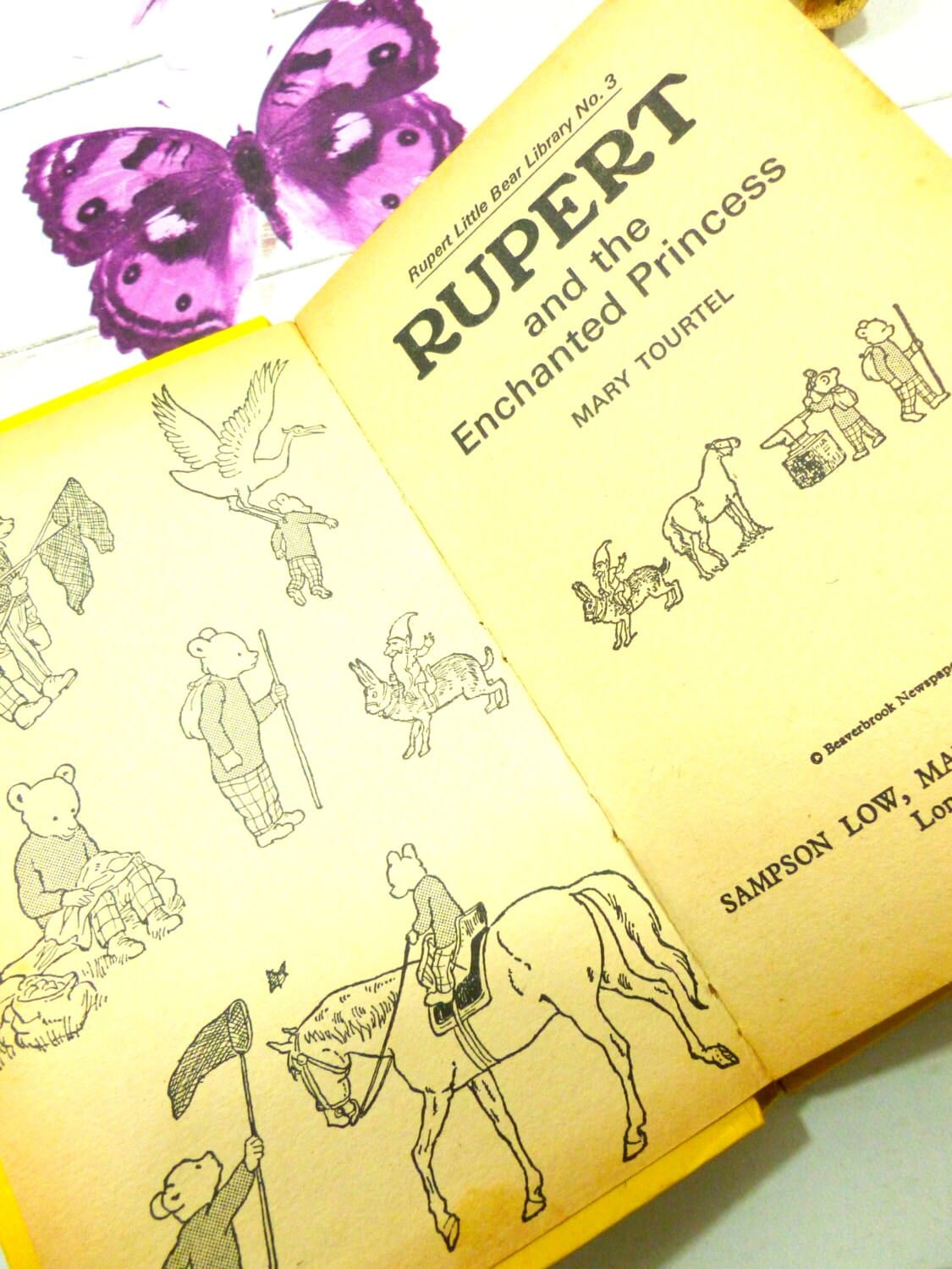 Black and white endpapers showing Rupert the bear illustrations in Rupert and the Enchanted Princess Mary Tourtel Little Bear Library number 3 1970s Vintage Hardback Rupert Book First Edition.