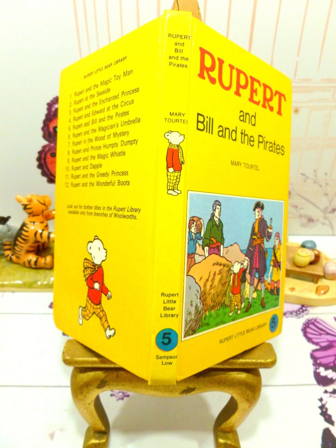 Front cover and spine of yellow book showing Rupert Bill and the Pirates Mary Tourtel Little Bear Library number 5 1970s Vintage Hardback Rupert Book 1st Ed.