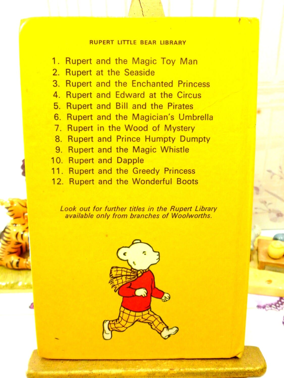 Back cover of yellow book showing Rupert Bear on Rupert in the Wood of Mystery Mary Tourtel Little Bear Library number 7 1970s Vintage Hardback Rupert Book 1st Ed