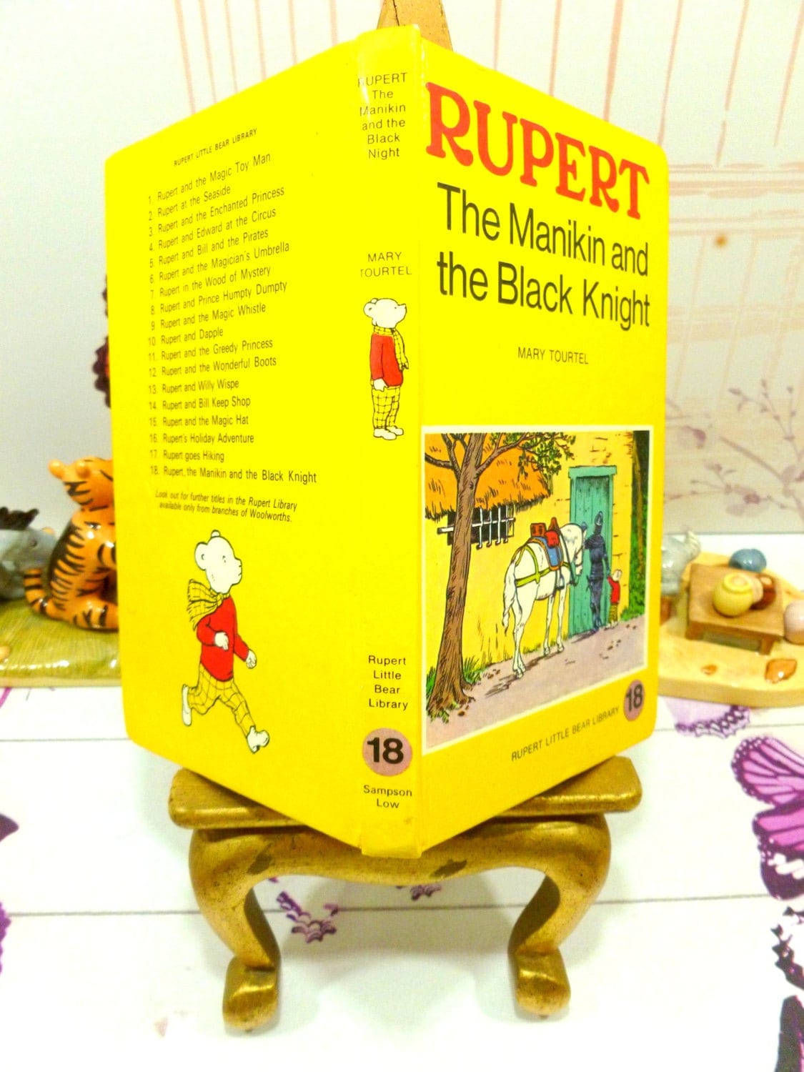 Spine and cover of Yellow book showing picture of Rupert The Manikin and the Black Knight Mary Tourtel Little Bear Library number 18 1970s Vintage Hardback Rupert Book 1st Ed