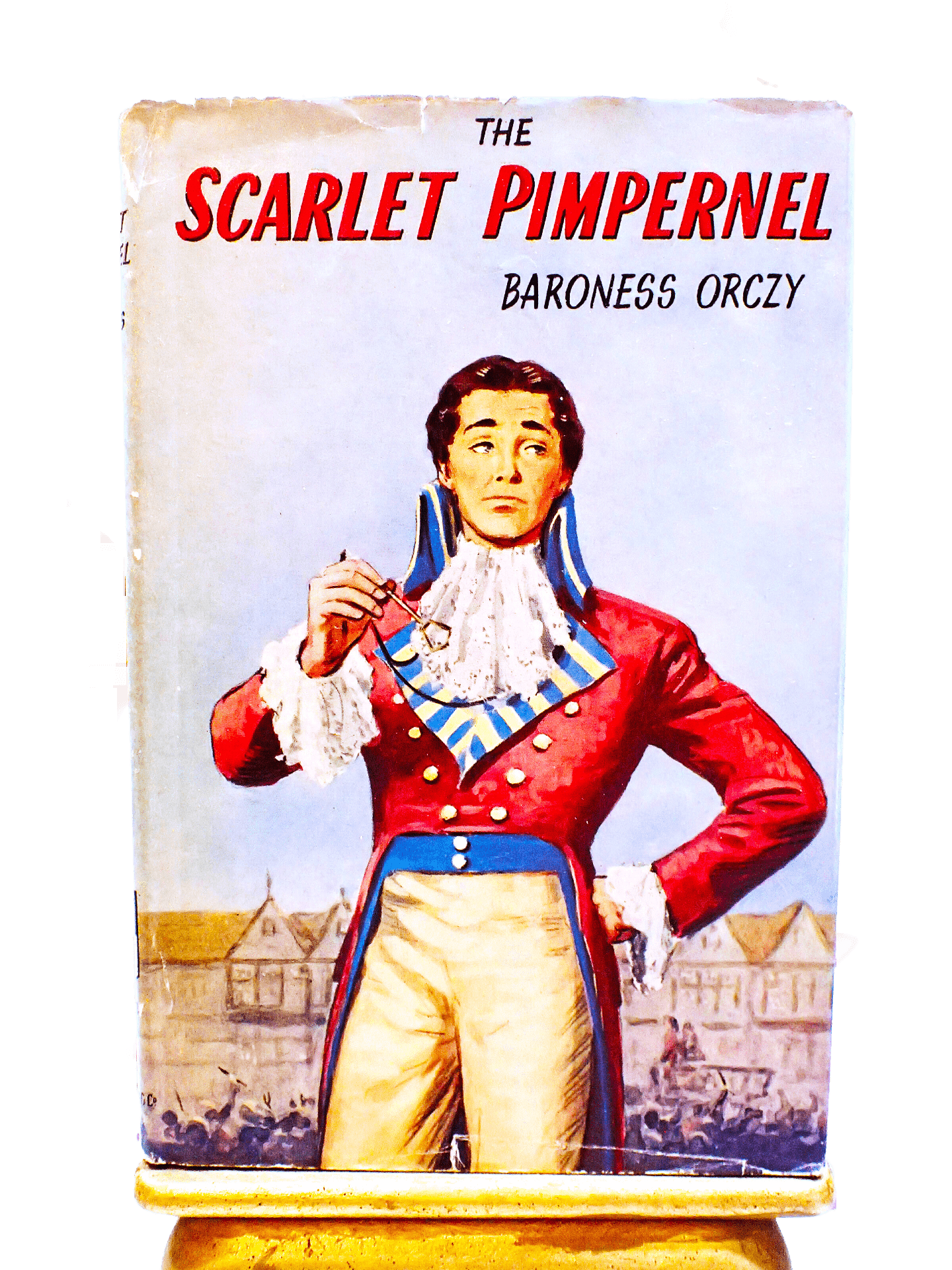Front Cover of The Scarlet Pimpernel by Baroness Orczy Thrilling Romance Classic 1940's Vintage Book showing Sir Percy Blakeney looking foppish. 