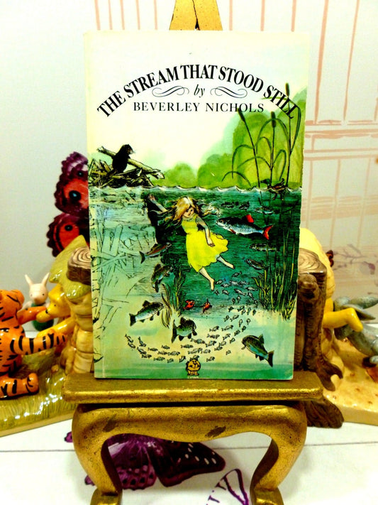 Front cover of The Stream that Stood Still Beverley Nichols Childrens Classic Vintage Fontana Lions Paperback showing a girl swimming with fishes. 