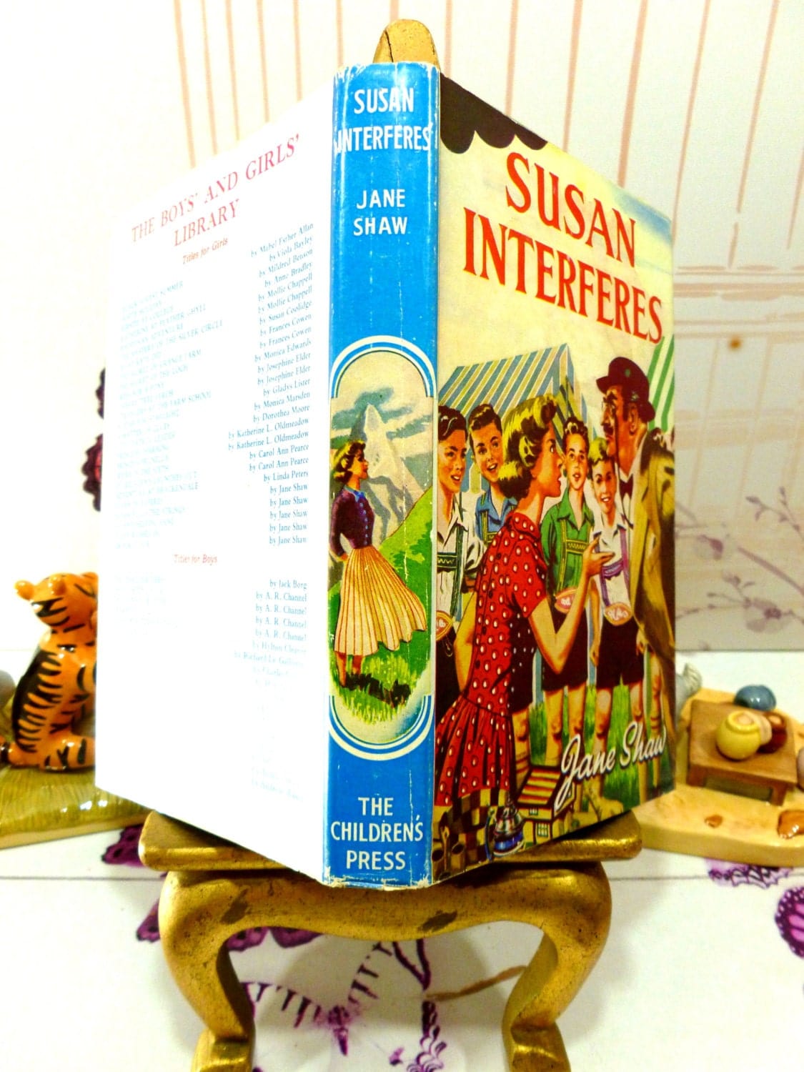 Full view of cover including spine of Susan Interferes by Jane Shaw Vintage Hardback book with DW Susan Stories The Childrens Press 1st Ed 1960s