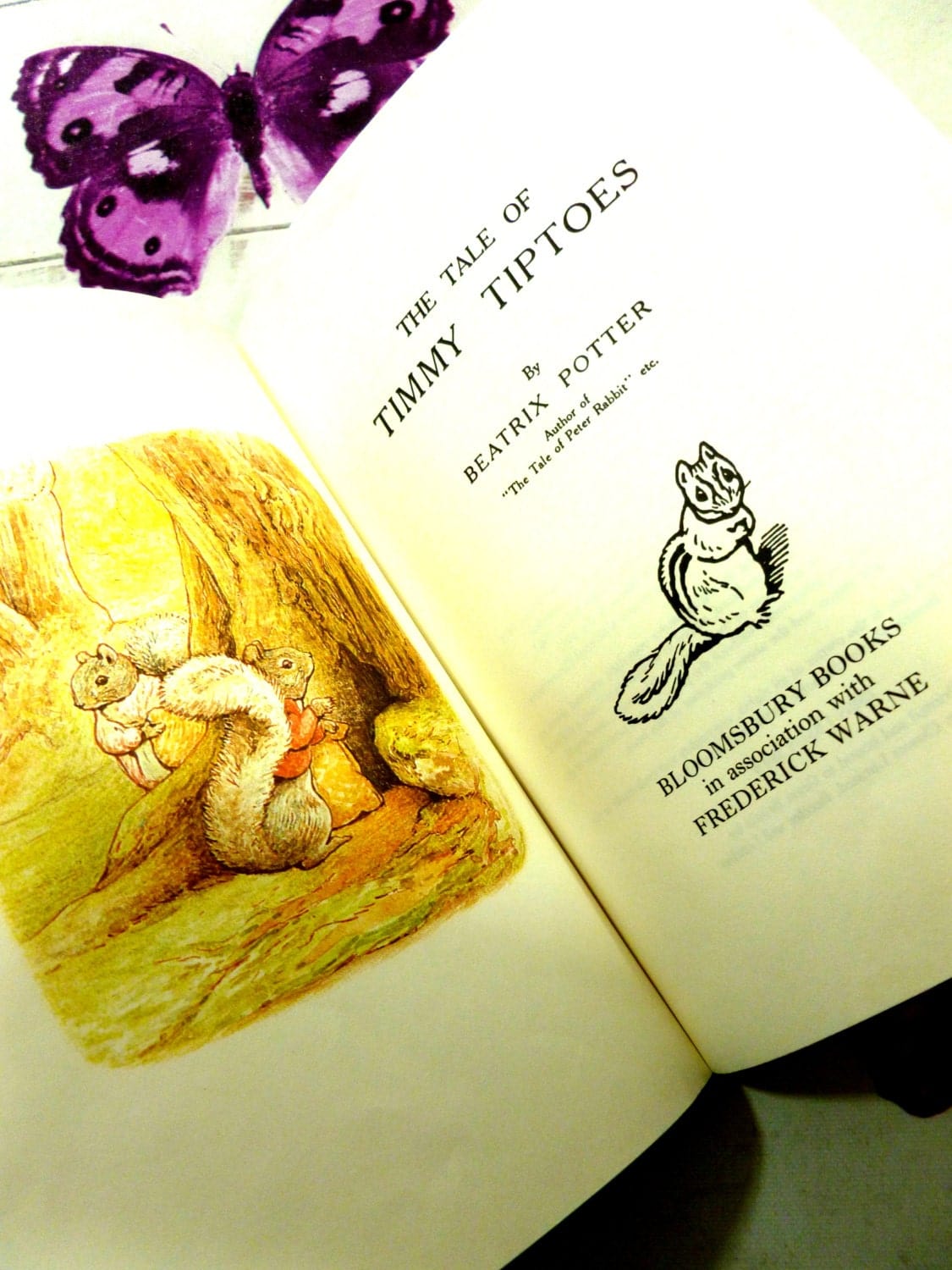 Title page and frontispiece of The Tale of Timmy Tiptoes First Edition Bloomsbury Book 1993 with Timmy Tiptoes Squirrel cameo and other Beatrix Potter squirrel characters. 