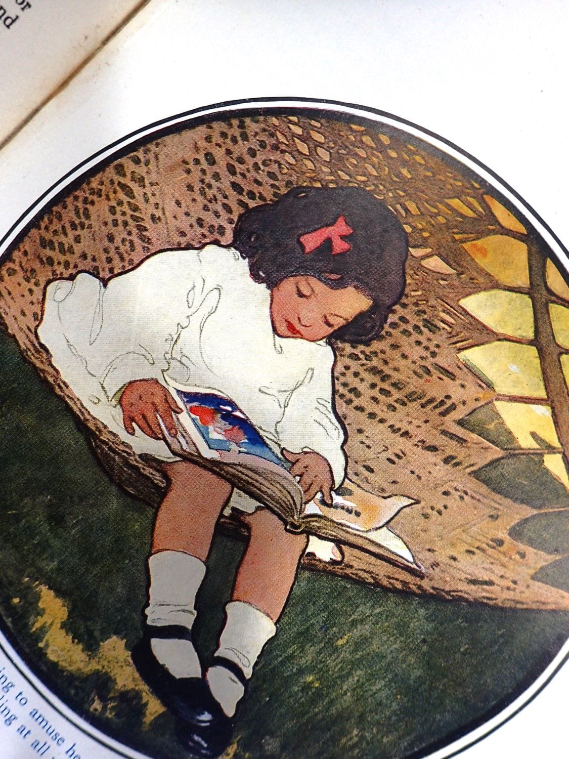 Girl reading a book Illustration by Jessie Wilcox Smith in 'The Everyday Fairy Book' antique children's book. 