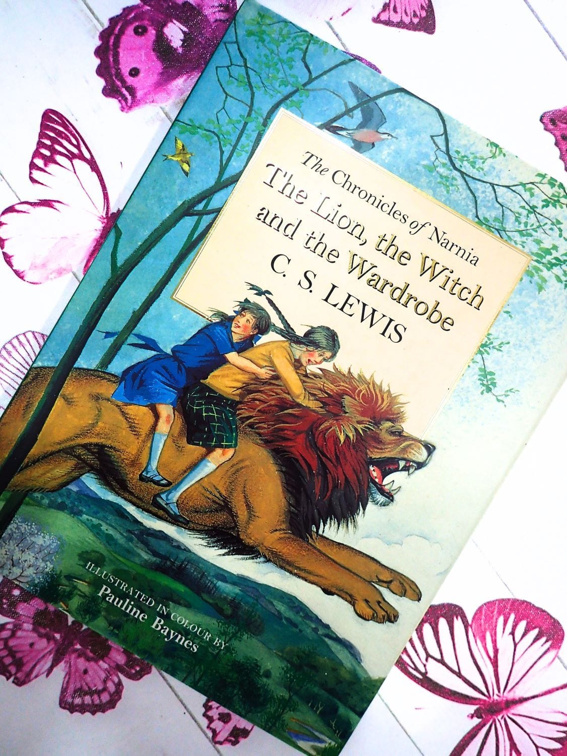 Front cover of The Lion, the Witch and the Wardrobe by C. S. Lewis vintage  children's book first edition thus