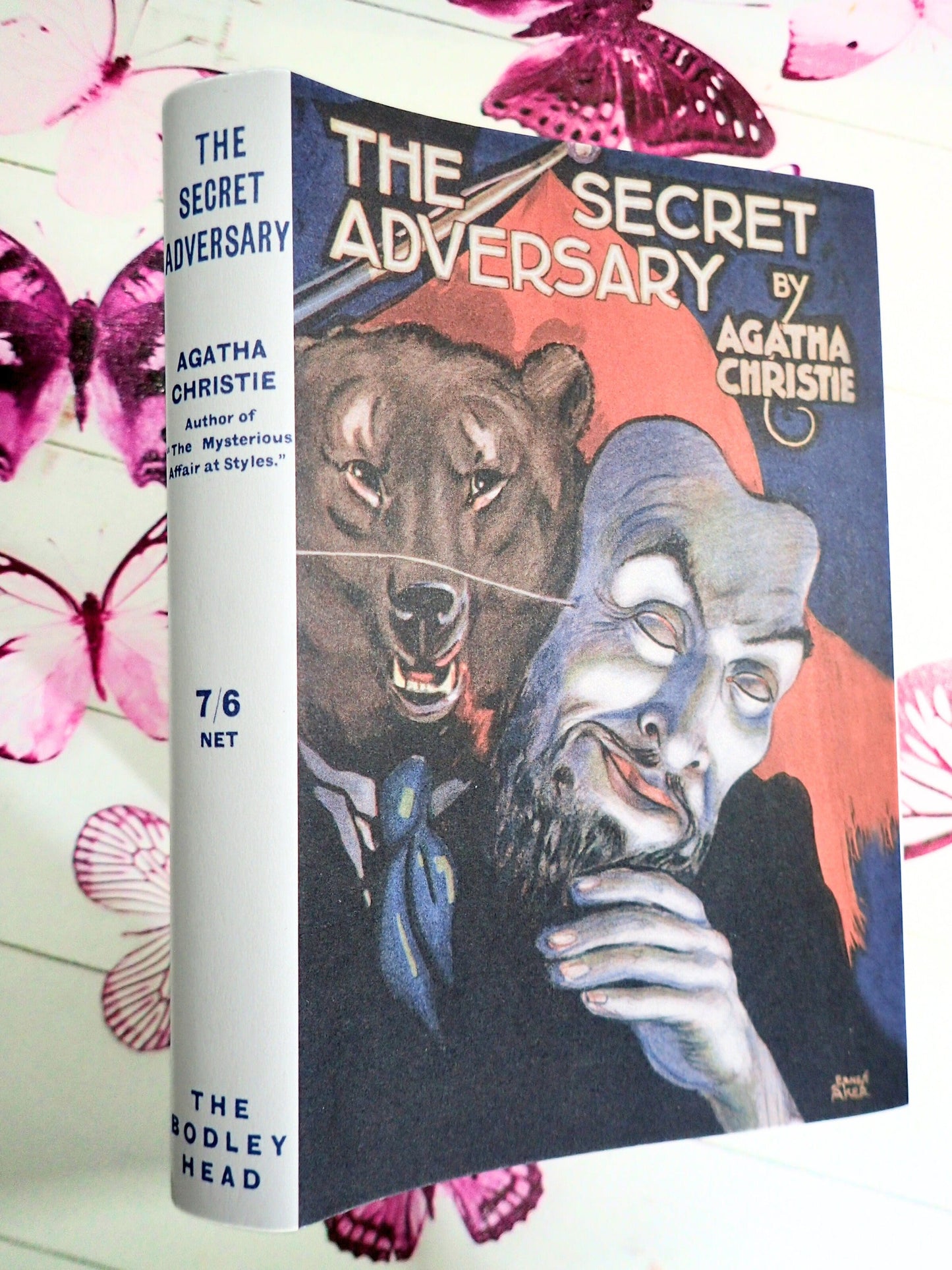 Spine showing blue titles on white of Vintage Book The Secret Adversary Agatha Christie
