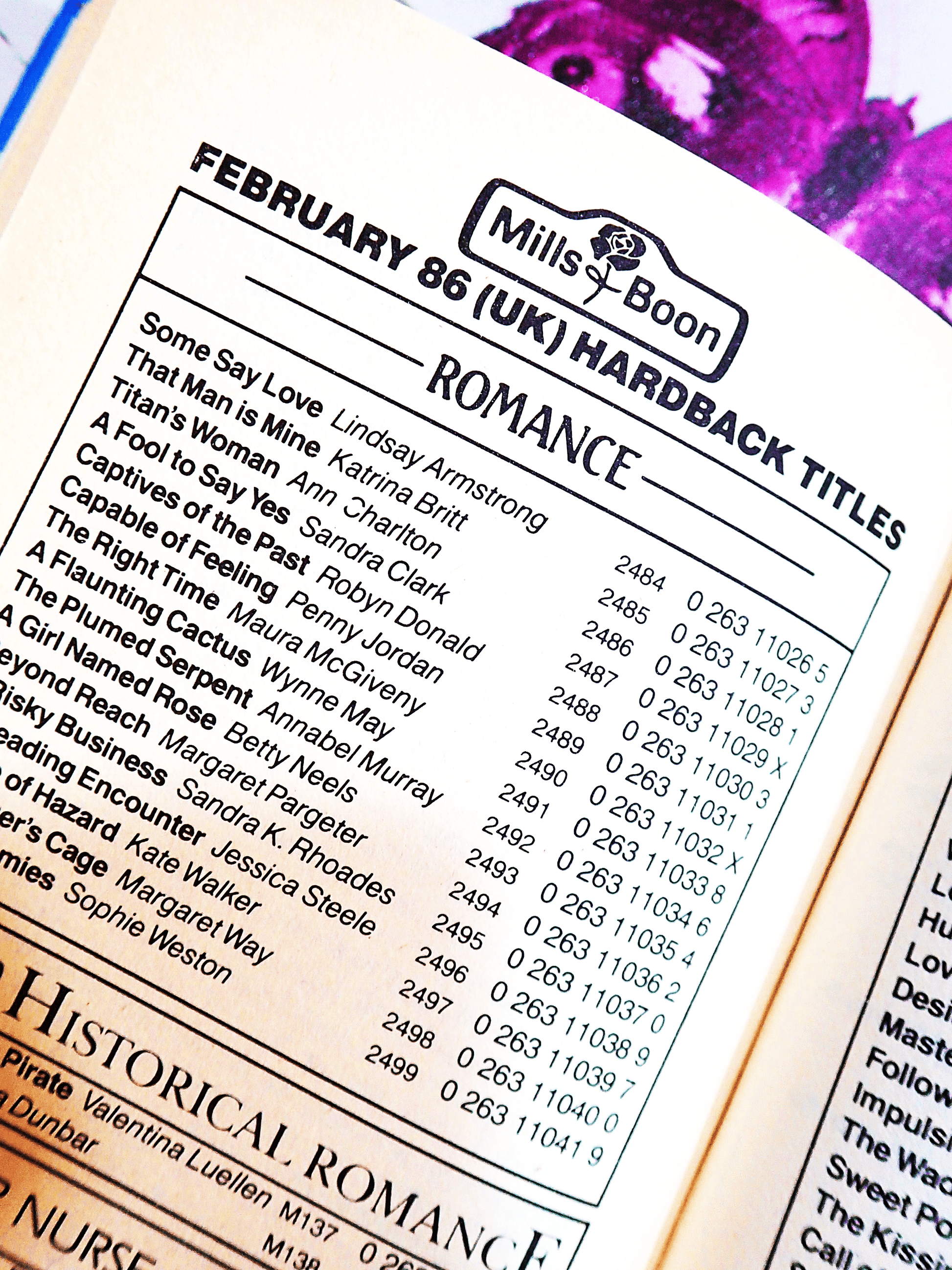 Page of Vintage Mills and Boon Romance That Man is Mine by Katrina Britt Hardback book 1980's showing February 1986 Hardback Titles list. 