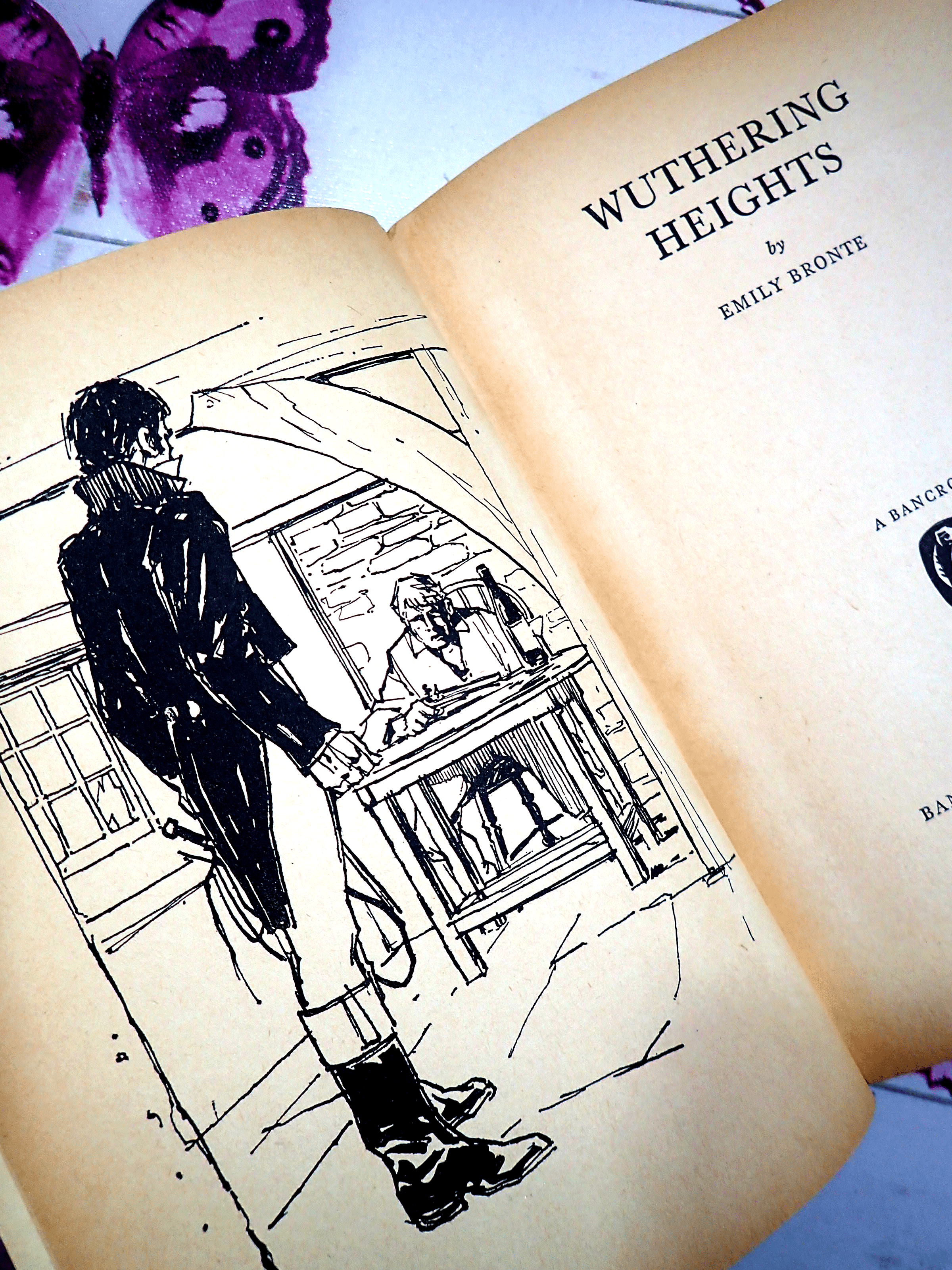 Page of Wuthering Heights Emily Bronte Bancroft Classics showing a man in tailcoat and boots with a whip. 